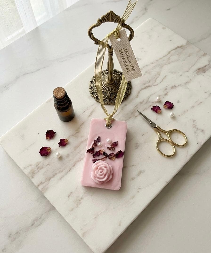 Handmade pink wax sachet with rose, dried petals, pearls and ribbon hanger